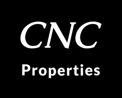 A black and white photo of the logo for cnc properties.