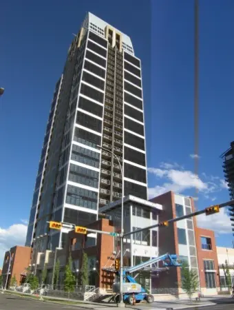 A tall building with a sky background