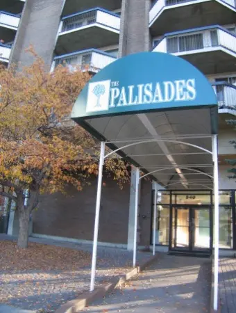 A building with a sign that says palisades.